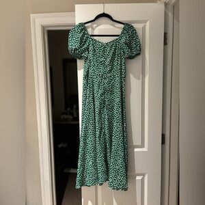 Perfect spring dress. Has a leg slit. Sleeves are off or on the shoulder!